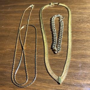 Vintage 3 piece gold plated jewelry. 2 necklaces and a bracelet.